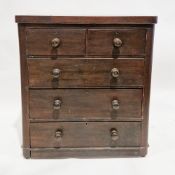 Victorian stained wooden chest, the rectangular top with rounded front corners, having two short and