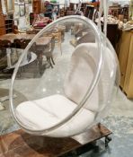 After Eero Aarnio clear acrylic hanging bubble chair having a chromed front frame, two cream