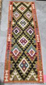 Maimana kilim runner, 20th century, woven with lozenges on a khaki black geometric pattern ground