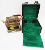 Castagnari ' Lilly ' melodeon, walnut case, having a bank of 21 mother of pearl effect right hand