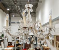 Glass five-branch electrolier in the rococo manner, with gilt metal fittings and prismatic crystal