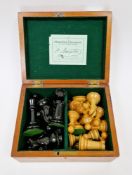 Staunton Chessmen chess set with ebonised and boxwood weighted chess pieces, king 8cm high, retailed