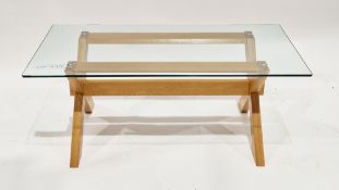 Modern glass-top lamp table on a pale oak X-frame base, 57cm high x 59.5cm wide x 60cm deep and a
