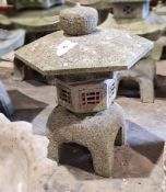 Japanese-style stone garden pagoda formed of four pieces, hexagonal top, 53cm high