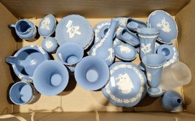 Collection of 20th century Wedgwood blue jasperware including pairs of vases, miniature models of