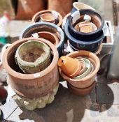 Large collection of plant pots in terracotta, glazed and reconstituted stone, in various sizes