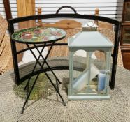 Black curved spark guard, a moulded glass small folding table decorated with poppies and a grey