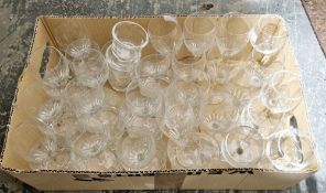 One box of glassware to include a pair of signed Steuben Crystal votive or toothpick holders with