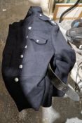 A Greater London Council D.B fire tunic with leather belt and pouch together with various fireman'