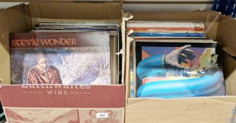 Collection of 70's/80's vinyl LPs including The Beatles, Sgt Pepper and Revolver (reissues), Bob