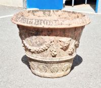 Large terracotta plant pot decorated with foliate swags, 44cm high x 57cm diameter