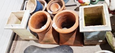 Two pairs of vintage chimney pots, one square section, the other round, 51cm and 45cm high (4)