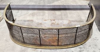 19th century brass and wirework nursery fender of round arch form, 89cm wide