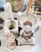 Collection of reconstituted stone garden items including seated buddha, moulded column, etc