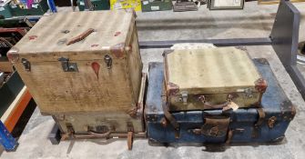 Four vintage leather bound suitcases (4).