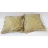 Pair of silk backed Fortuny cushions with cream coloured braid detail, one narrow tie back/