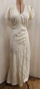 Three 1930's silk nightgowns, similar style, one embroidered with blue chain stitch, one with pink