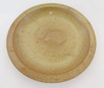 Ray Finch (1914-2012) for Winchcombe stoneware charger, speckled ground with incised wave
