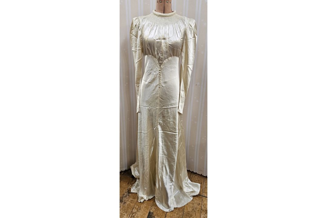 1920's/30's satin wedding dress, with smocked and rolled collar, fitted sleeves, button detail to - Image 1 of 6