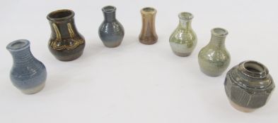 Seven Winchcombe small and bud vases to include Ray Finch small vase, shouldered, panelled and