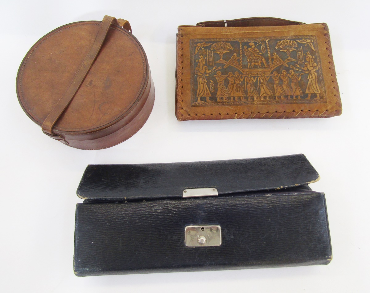 An Edwardian leather travel case for Handkerchiefs and Gloves - labelled as such with contents,