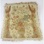 19th century French tapestry cushion depicting a vase of flowers between two floral columns, 50.