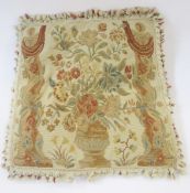 19th century French tapestry cushion depicting a vase of flowers between two floral columns, 50.