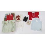 Various children and baby clothes to include smocked dresses, smocked silk baby gowns, a red wool