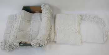A large cotton waffle bedspread with crocheted border, a fine crocheted bedspread, and a coarse
