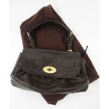 A vintage brown leather Mulberry bag with single strap handle, lining printed with the Mulberry