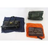 Vintage Fiorenza black leather Birkin-style bag, a brown leather clutch bag with foldover front,