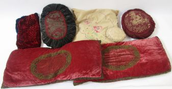 A quantity of Edwardian cushions to include a velvet bolster with embroidery and braid detail, and