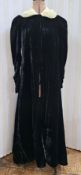 Early 20th century black velvet opera coat with leg o mutton sleeves, white mink collar, satin