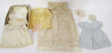 Assorted baby and children's clothes to include a satin christening gown overlaid with lace,  a