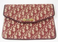 Christian Dior fabric clutch bag, trimmed with leather, metalware with CD logo, 25.5cm across x 18.