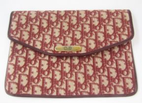 Christian Dior fabric clutch bag, trimmed with leather, metalware with CD logo, 25.5cm across x 18.
