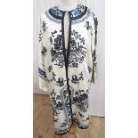 An early 20th century Chinese robe, embroidered with silk blue and gold thread, with a embroidered