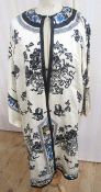 An early 20th century Chinese robe, embroidered with silk blue and gold thread, with a embroidered