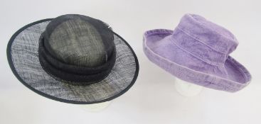 Assorted hats to include a red velvet beret, a black beret, a Marks & Spencer fedora, some straw