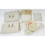 Two flour sacks, both initialled AA, embroidered crocheted and lace nightdress cases, one named