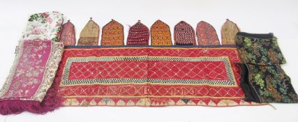 Two vintage Banjara toran door or wall hangings, a printed silk shawl purple ground with a deep