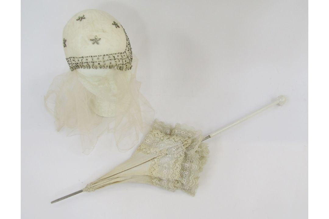 A 1920's wedding headdress, glass bead decoration, and a Edwardian cream linen parasol trimmed - Image 1 of 3