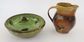 Sidney Tustin bowl, green glazed with brown stylised flowerhead and trail decoration, 21cm