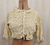 An Edwardian lace blouse with frilled collar, three quarter length sleeves, another Edwardian cotton