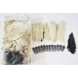 Large quantity of lace pieces, trimmings, mats, part collars some undyed, some black lace pieces,