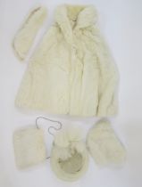 White coney cape with a white coney hood, matching scarf and muff, and a 1950's/60's vintage fur hat