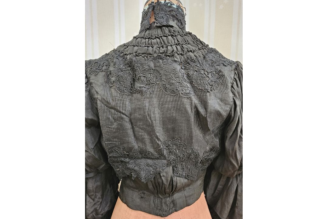 A black Victorian open-work skirt with pleated flounces and lace trim, the final flounce is - Image 2 of 3