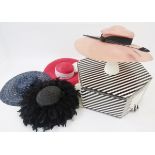 Ascot/wedding hats, pink ciname wide brimmed hat with black band and black stripped feather