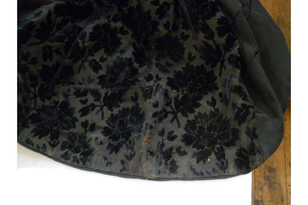 A black Victorian probably mourning dress, with cut velvet detail to the inner bodice, appliqued - Image 13 of 15