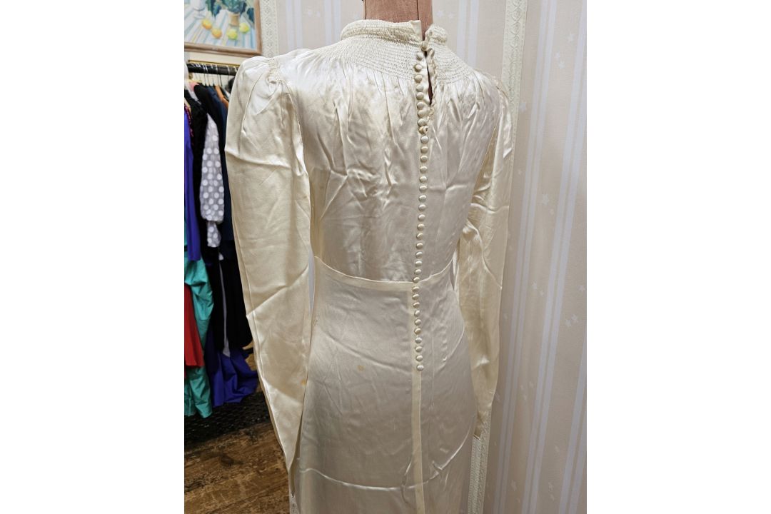 1920's/30's satin wedding dress, with smocked and rolled collar, fitted sleeves, button detail to - Image 2 of 6